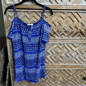 Cute summer dress very comfy !  Has liner.